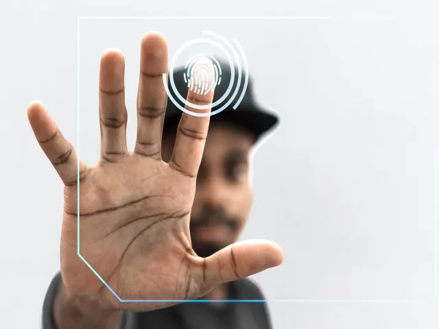 Illustration of a hand presenting a fingerprint identity for verification